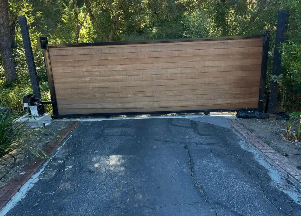 Fence Contractor in San Jose creating a stylish decorative metal gate for a residential entrance