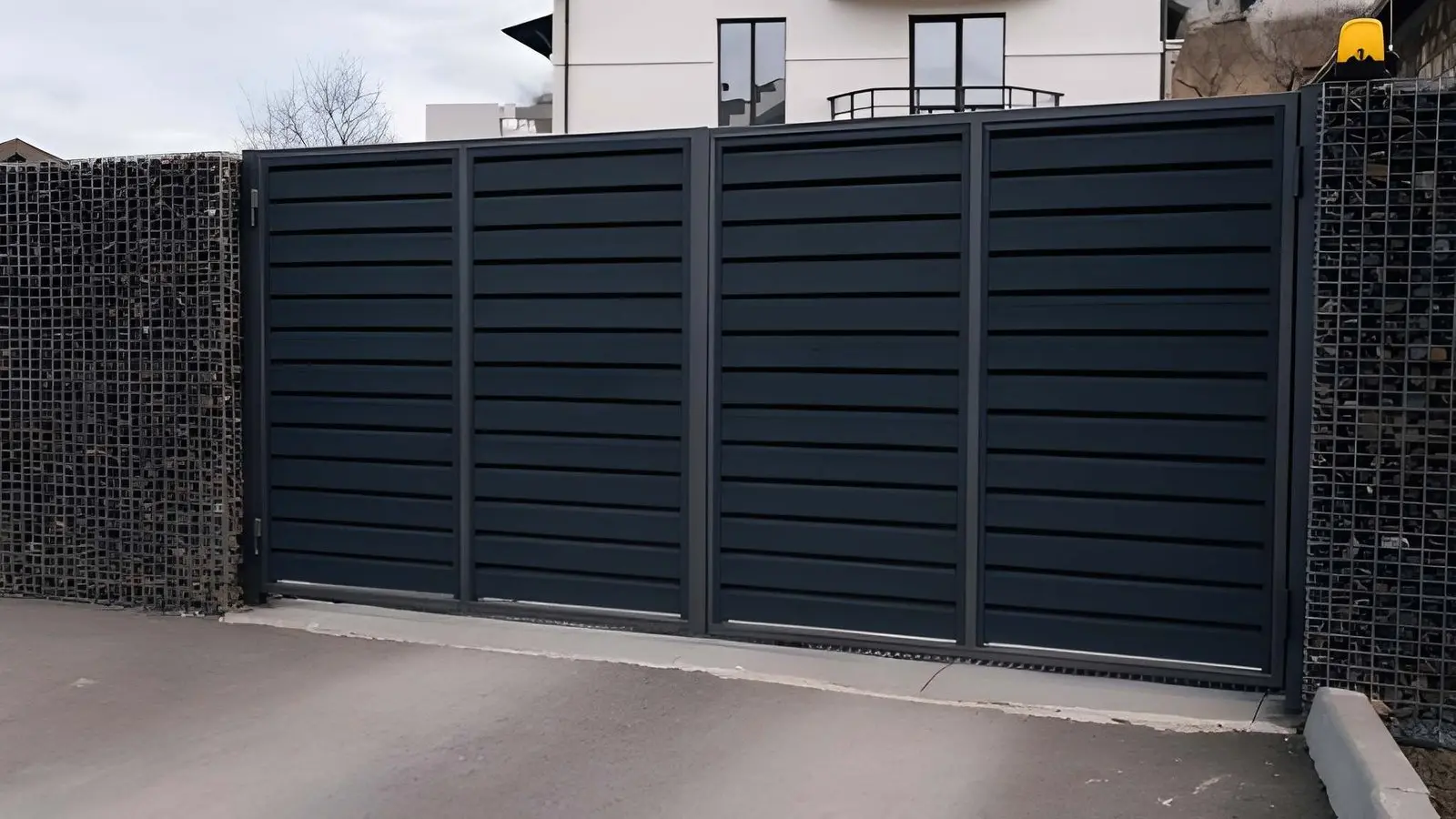 Technician performing Gate Repair on automatic gate motor system