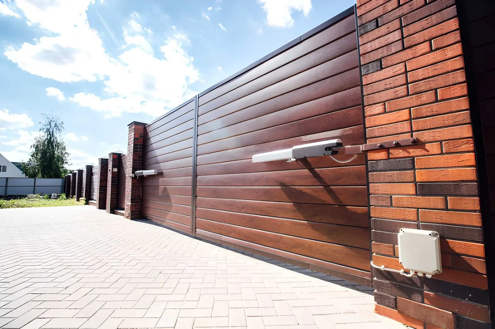 Electric Gate Installation showing secure residential driveway entry with automated swing gate