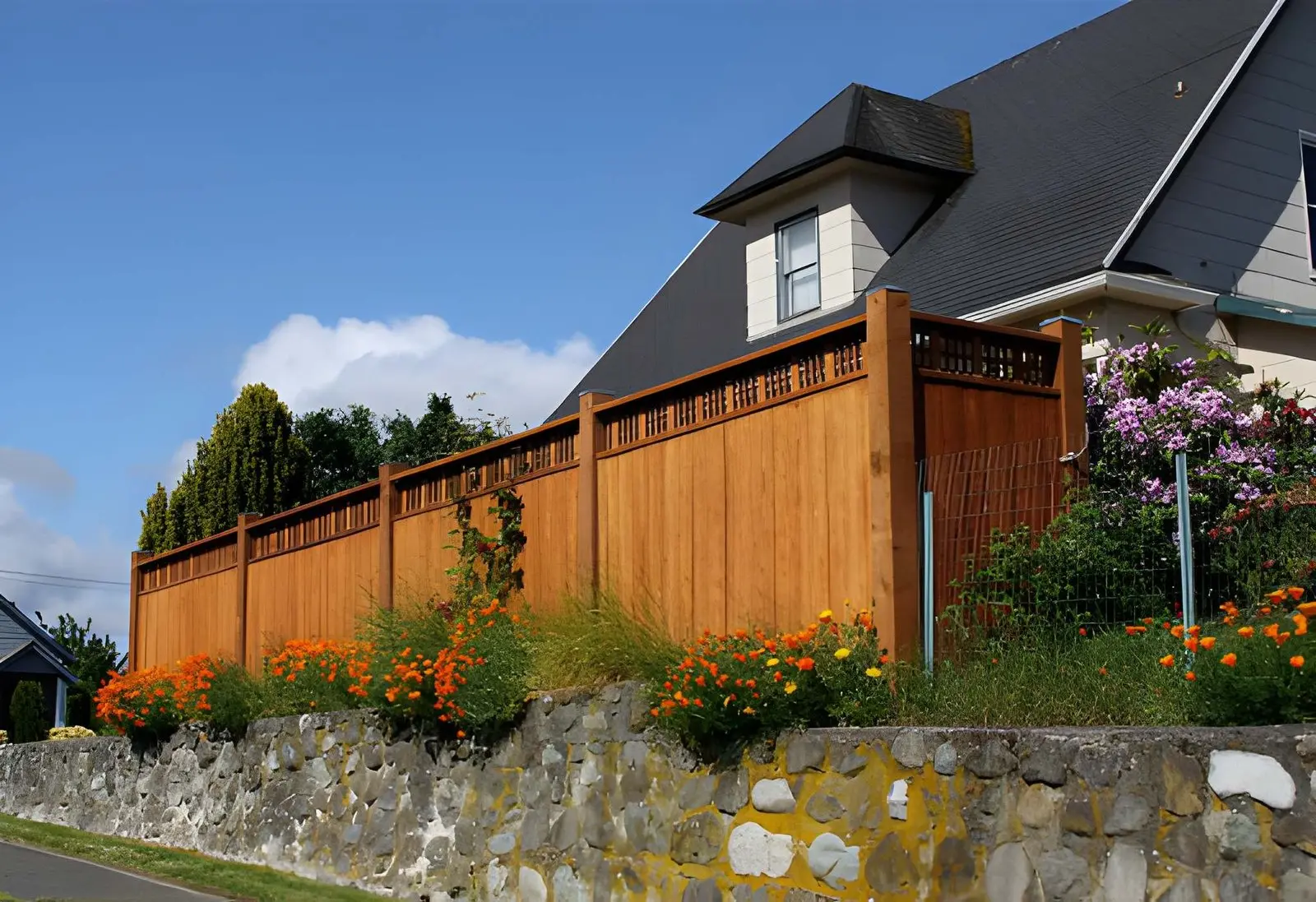 Fence Contractor installing modern residential fencing system with secure boundary layout