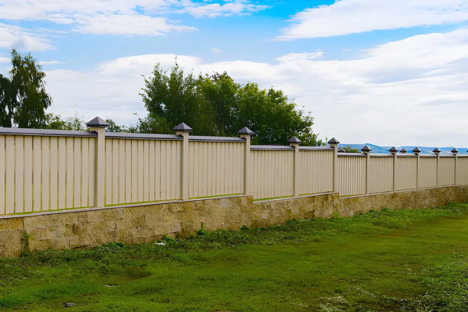 Fence Builders creating residential security fencing with durable materials
